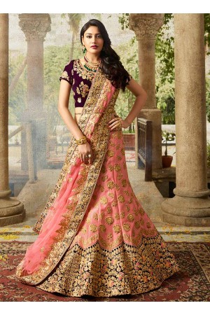 Pink color silk velvet and net wedding lehenga choli