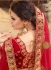 Red color satin silk and net wedding lehenga