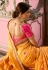 Yellow and pink Indian wedding silk Saree