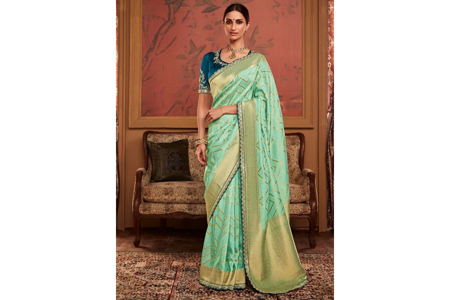 Pista Green Saree In Dola Silk With Woven Buttis And Floral Weave On Pallu