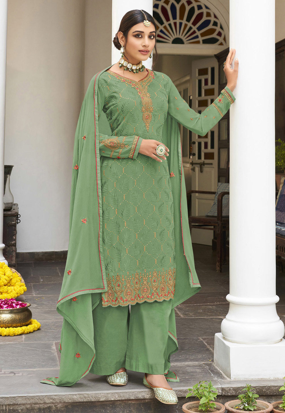 https://www.kollybollyethnics.com/image/catalog/data/04Apr2023/Georgette-pakistani-suit-in-Pista-green-colour-161330.jpg