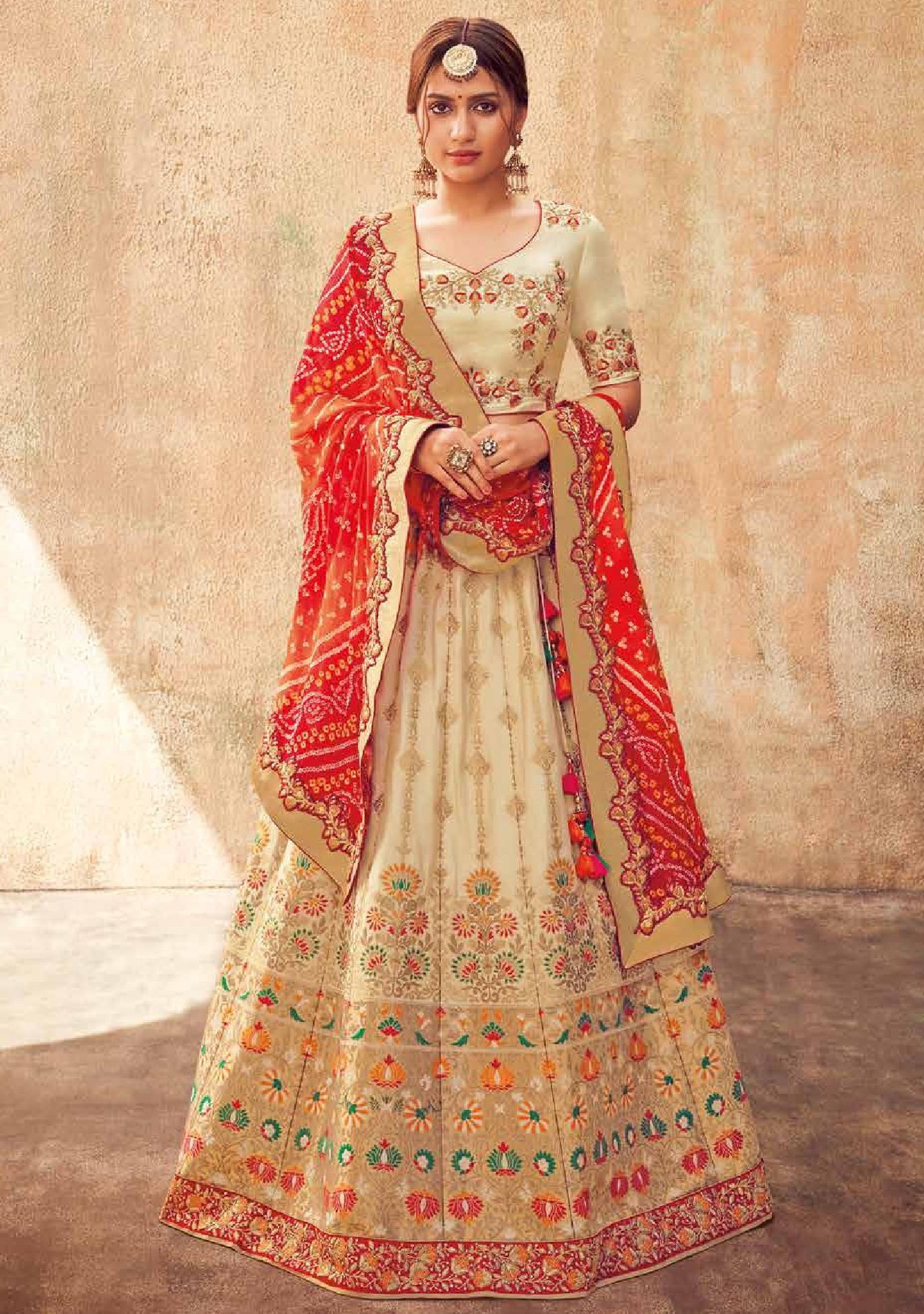 red and cream bridal lehenga