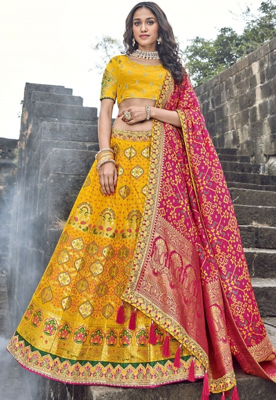 A grey and yellow combination raw silk lehenga studded with Swarovski  crystals by Shantanu & NIkh… | Indian bridal dress, Bollywood outfits,  Designer dresses indian