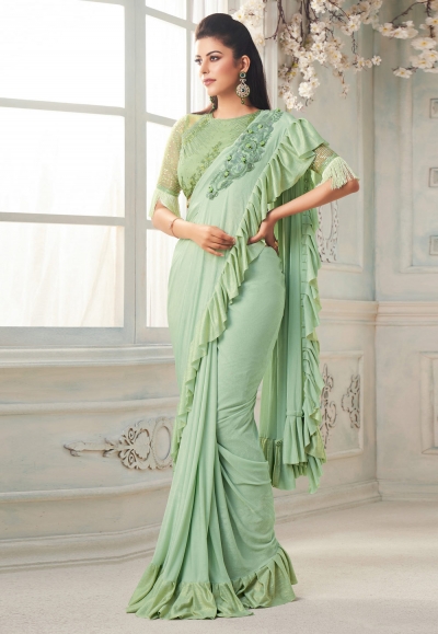 Light green silk ruffle border saree 7109