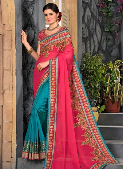 In a pink color half saree, ink blue color elbow length sleeve checks blouse  design, necklace and head… | Half saree designs, Pink half sarees, Lehenga  saree design